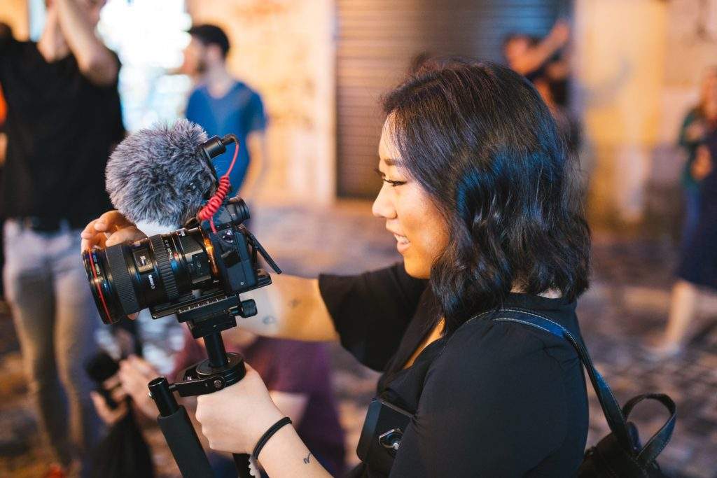 photo of a female videographer and photographers singapore based